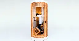 standing sleeping pods help people take power naps on their feet while in the office or cafés